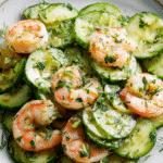 U3823717446 Bright Sunlit Close Up Of A Plated Fresh Cucumber 66b04da4 C33c 42fc B5dd Efc2c8b34958 1
